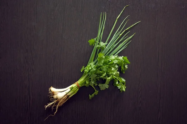 Spring onion and coriander at market — Stock Photo, Image