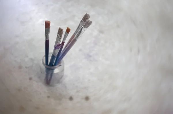 Paint brushes in a jar , Concept art background