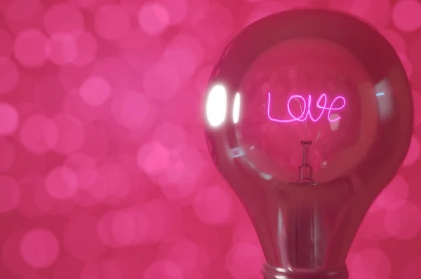 Rendering Hintergrund Nahaufnahme Aufschrift Liebe Glühende Glühbirne Mit Rosa Bokeh — Stockfoto