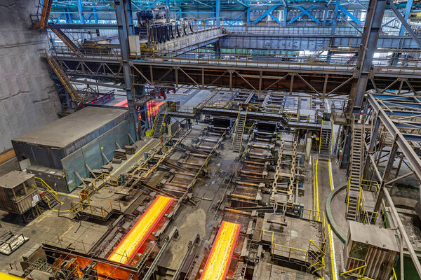 Novokuznetsk, Russia, June 4, 2019. Excursion to metallurgical plant EVRAZ ZSMK. Oxygen converter shop. View down on panorama of production.