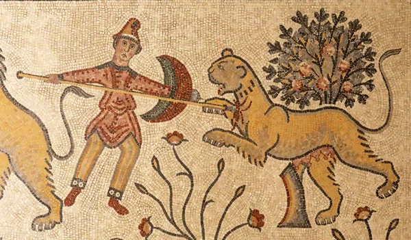 Man killing lioness in ancient mosaics of Mount Nebo, Jordan