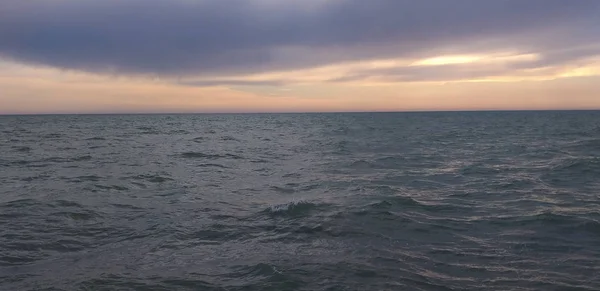 relaxing sea landscape with clouds and waves