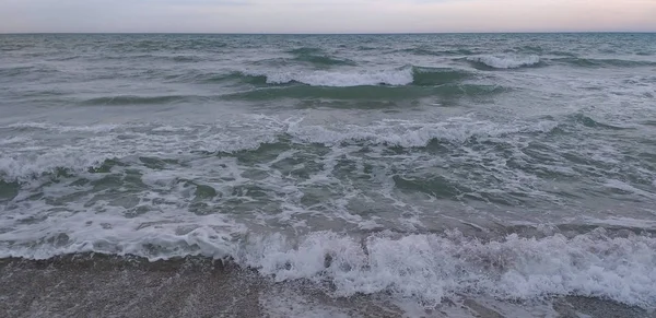 relaxing sea landscape with clouds and waves