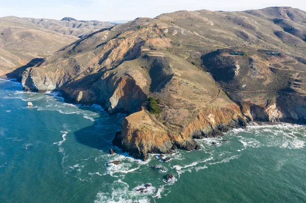 The cold water of the Pacific Ocean washes onto the scenic and rugged coastline of northern California just above San Francisco.