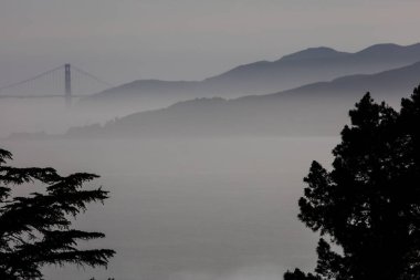 Seen from the East Bay the Golden Gate Bridge connects the city of San Francisco with the Marin Headlands. clipart