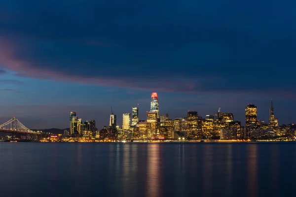 The northern California city of San Francisco skyline is seen at dawn. This beautiful city is surrounded by San Francisco Bay and the Pacific Ocean.