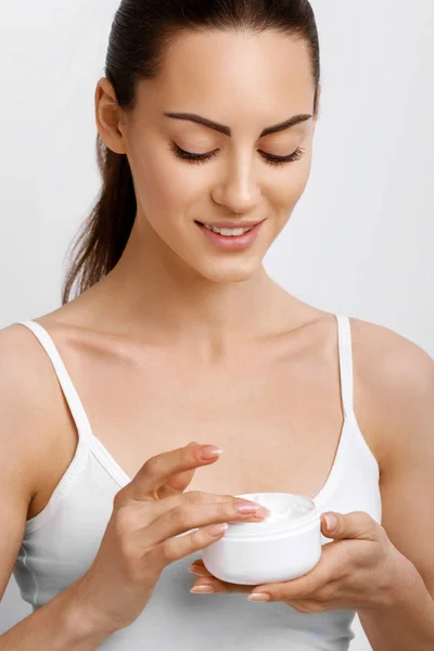 Woman Holding Cosmetic Cream Face Skincare Female Applying Cream Smiling — Stock Photo, Image