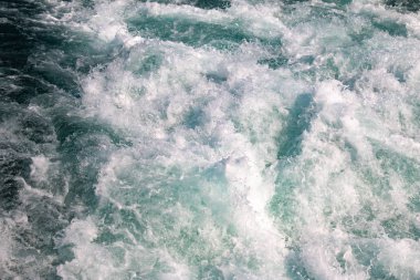 Yüzey su deniz su dalgaları arka plan doku, beyaz köpük dalgalar.