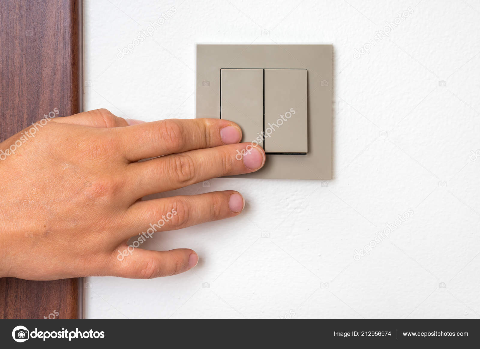 Woman turning on left signal switch, close up shot of her hand