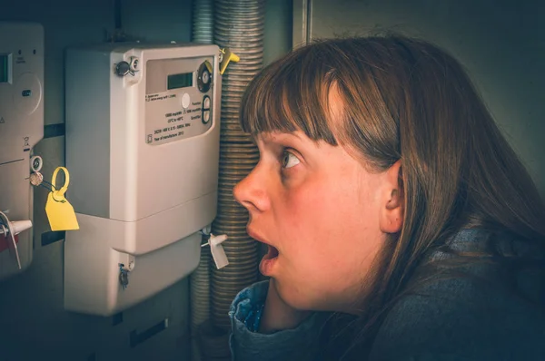 Terrified Woman Checking Electricity Meter Consumption Expensive Electricity Concept Retro — Stock Photo, Image