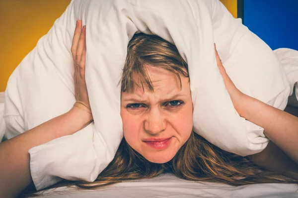 Attractive Woman Bed Covering Ears Pillow Because Noise Insomnia Concept — Stock Photo, Image