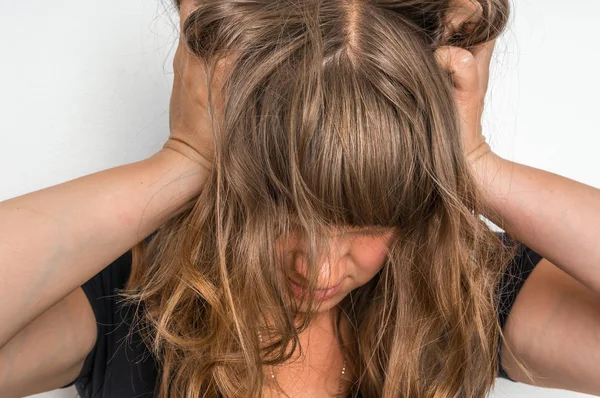 Depressed Woman Hands Her Hair Isolated Gray Background — Stock Photo, Image