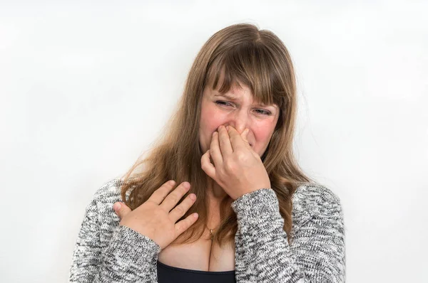 Pretty Woman Holding Her Nose Bad Smell Concept — Stock Photo, Image