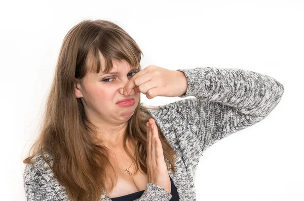 Vacker Kvinna Håller Näsan Dålig Lukt Koncept — Stockfoto