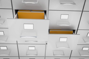 Açık bir çekmece sarı klasörlerle kabine dosyalama