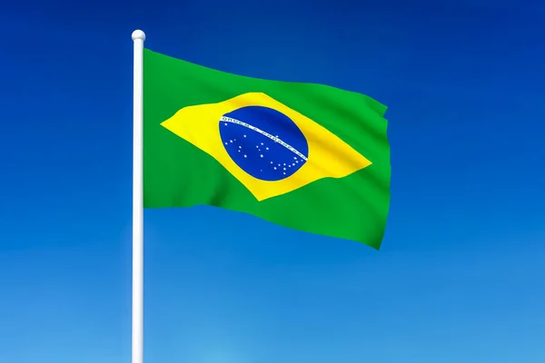 Ondeando la bandera de Brasil sobre el fondo azul del cielo — Foto de Stock