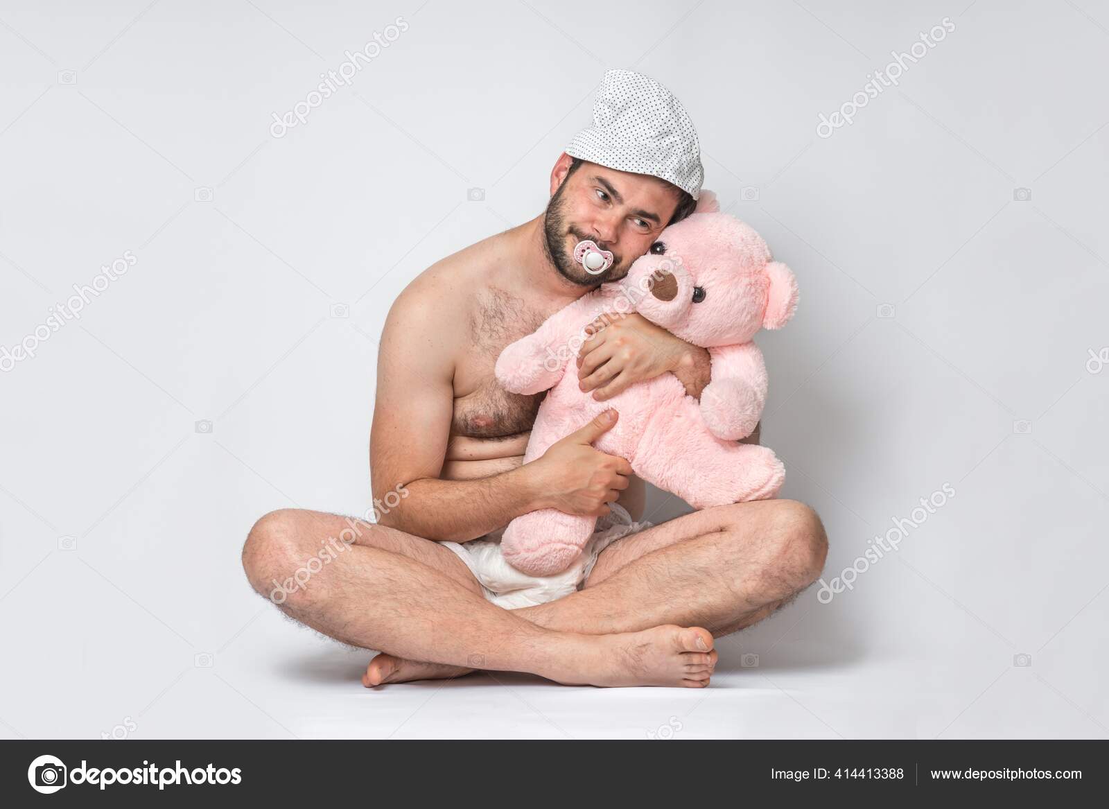 Infant Adult Man Pacifier Diaper Holding Pink Teddy Bear Big Stock Photo by  ©andriano_cz 414413388