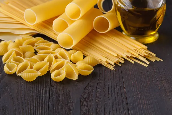 Dried Mixed Pasta Dark Wooden Table Top View Copy Space — Stock Photo, Image