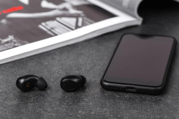 Bluetooth earphones for listen music in any weather on street