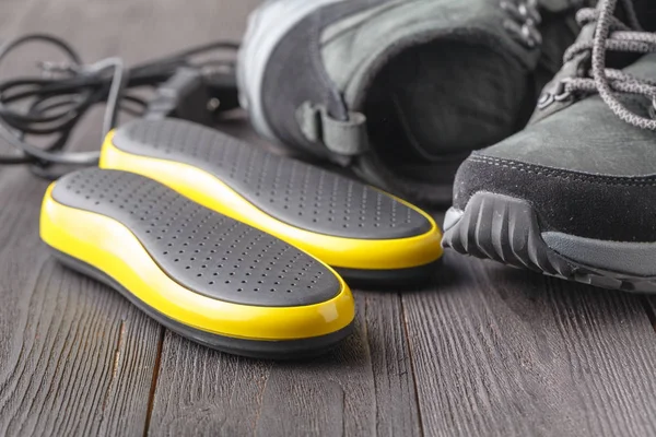 Dryers Shoes Wooden Background — Stock Photo, Image