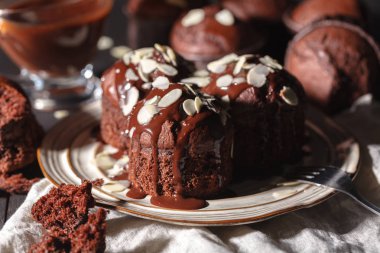 Chocolate muffins with crispy top (selective focus)