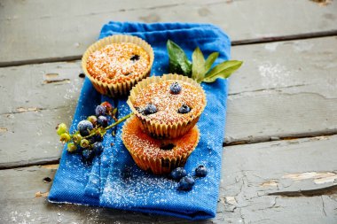 Homemade blueberry muffins clipart