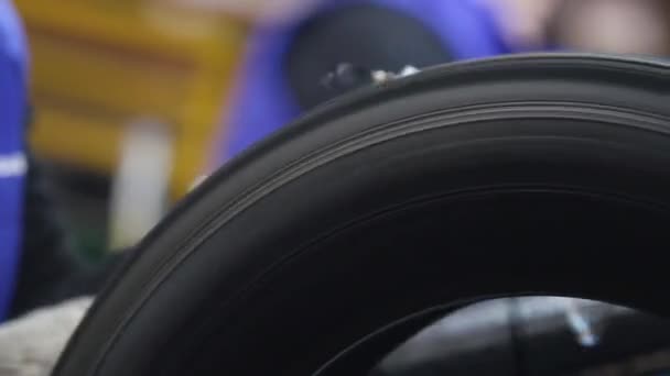 Tool for stripping tires after molding. — Stock Video