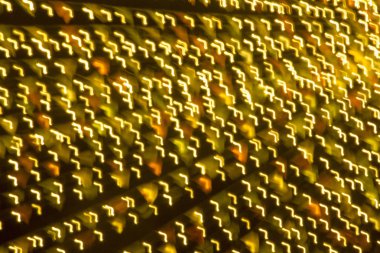 Soyut xmas altın pırıltılar veya parlak ışıklar. Noel şenlikli altın arka plan. Ufuk bokeh parçacıklar. Tasarım şablonu