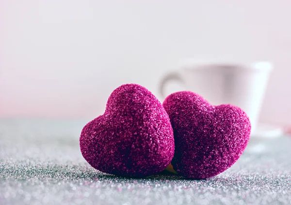 Red heart on a silver background. Heart of marmalade. Candy heart. Background to the day of lovers, background of love