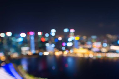 Bulanık arka plan ışık, güzel cityscape görünümünü Singapur şehir manzarası, gece.