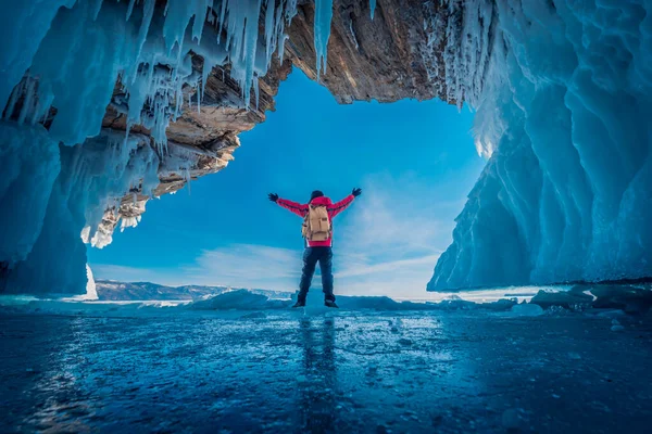 Traveler Man Wear Red Clothes Raising Arm Standing Frozen Water — Stock Photo, Image