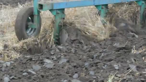 Steel tractor furrows plow land in late autumn — Stock Video