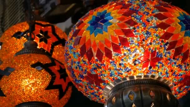 Many multi-colored Turkish mosaic lamps on ceiling market in the famous Grand Bazaar in Istanbul, Turkey — Stock Video