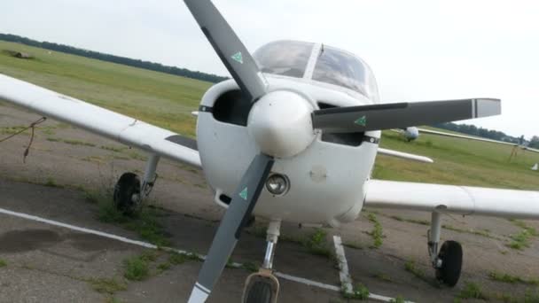 Dnipro, Ukraine - June 21, 2020: White small passenger aircraft stand at the airport — Stock Video