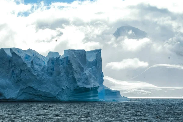 Antarctic icebergs in the waters of the ocean. Antarctic landscape Antarctic icebergs in the waters of the ocean. Antarctic landscape