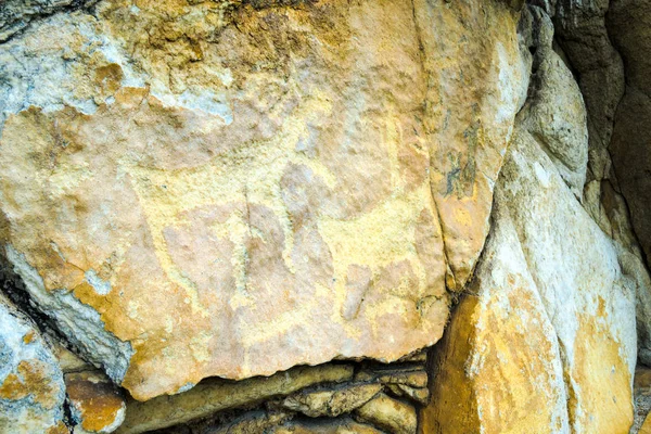 Rock paintings on stones, rocks with pictures on Baikal.