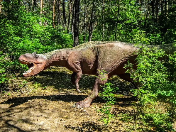 Ceratosaurus among the thickets of the forest