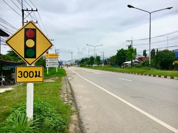Sign board alert trafic light  at junction Thailand. translate to English \