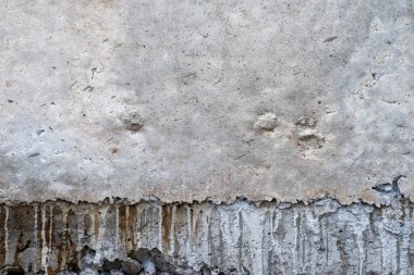 Tamamlanmamış alçı gibi beton yüzey duvarı soyut arkaplan dokusunu gösterir.