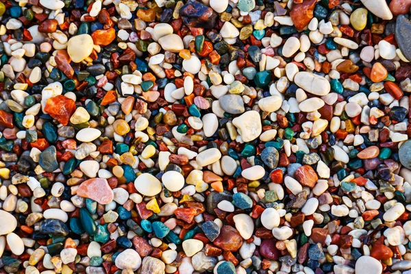 海滩上五彩斑斓的海卵石 抽象的背景 — 图库照片
