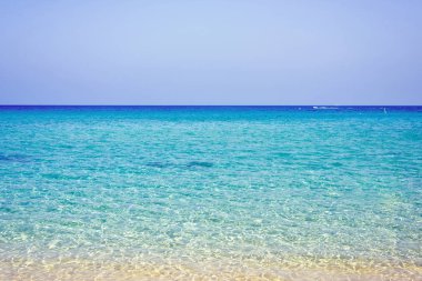 Daylight view to a sea landscape. Blue water and chill emotions. Negative copy space, place for text. Nissi beach, Ayia Napa, Cyprus. clipart