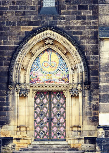 Gothic ornamented entrance doors to Basilica of St. Peter and St. Paul. Prague, Czech Republic