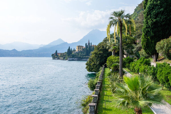 Lake Como with mountains on background. View from Villa Monastero. Varenna, Italy