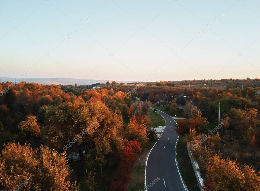 Roads of Moldova at sunset in autumn season. Warm colors. Aerial shot