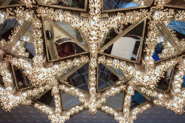 ceiling decorated with triangular mirrors