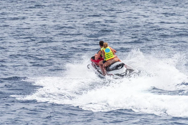 Man and a woman on a jet sky — Stock Photo, Image
