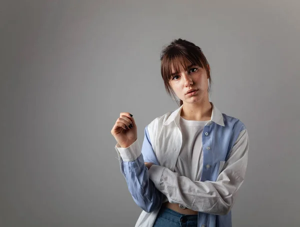 Young caucasian girl posing in the studio — Stock Photo, Image