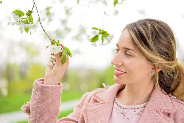 stock image Young blonde lady enjoying spring time