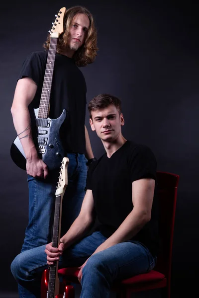 Rock band consisting of two young caucasian adults