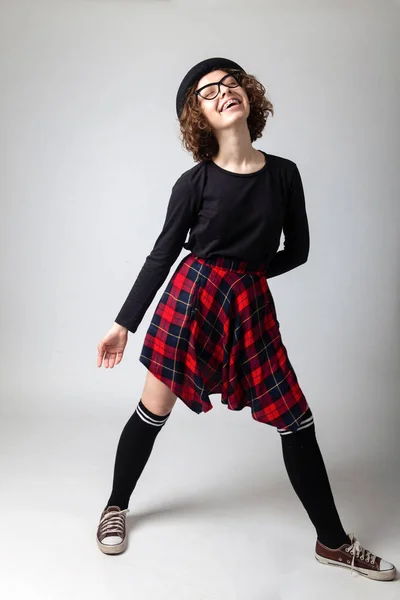 Young caucasian highschool girl posing in the studio — Stock Photo, Image